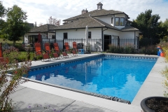 Boulder pool with automatic CoverStar Cover, Mountain Top pattern custom liner and concrete deck